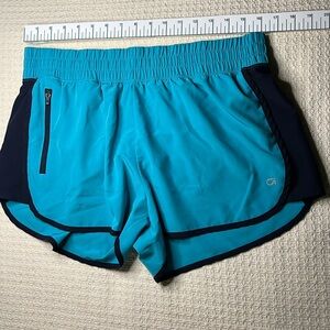 GapFit running shorts with large zip pocket, turquoise & black, attached panties